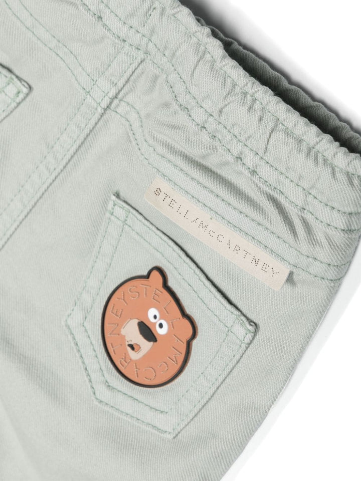 Pantaloni verde salvia neonato con applicazione logo