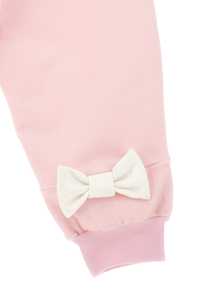 Pantalone rosa neonata con applicazioni posteriori