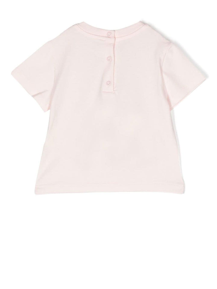 T-shirt rose avec logo imprimé sur le devant
