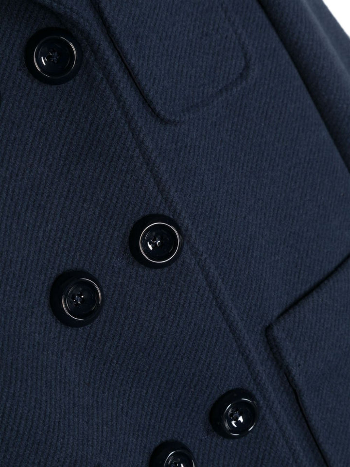 Manteau fille bleu, avec quatre poches, fermeture sur le devant avec boutons,