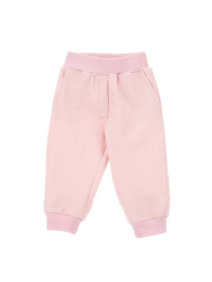 Pantalon rose bébé avec applications au dos