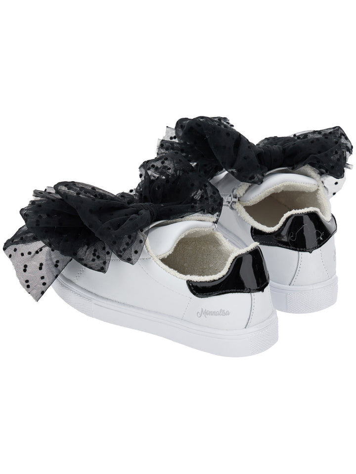 Sneakers bianche bambina con ruches nere applicate