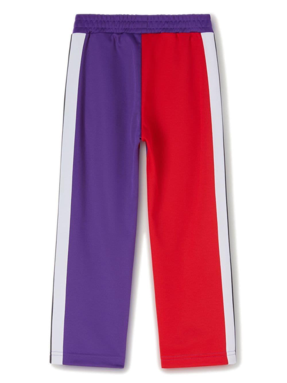 Pantalone viola/rosso bambino