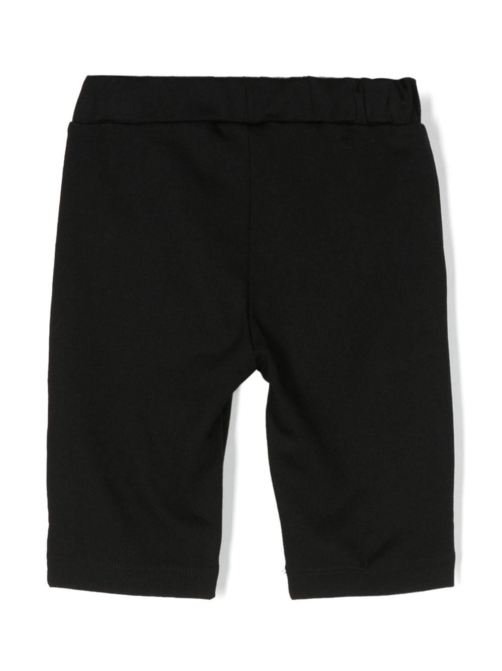 Pantalone nero bambina con bottoni oro