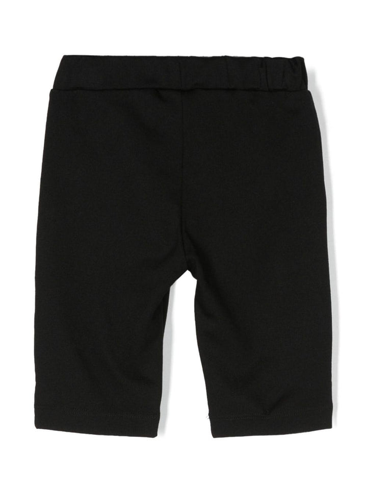 Pantalone nero bambina con bottoni oro