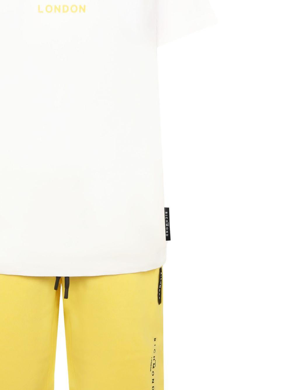 completo bianco/giallo bambino