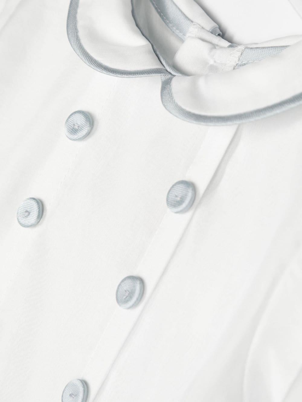 Tutina bianca/azzurra neonato