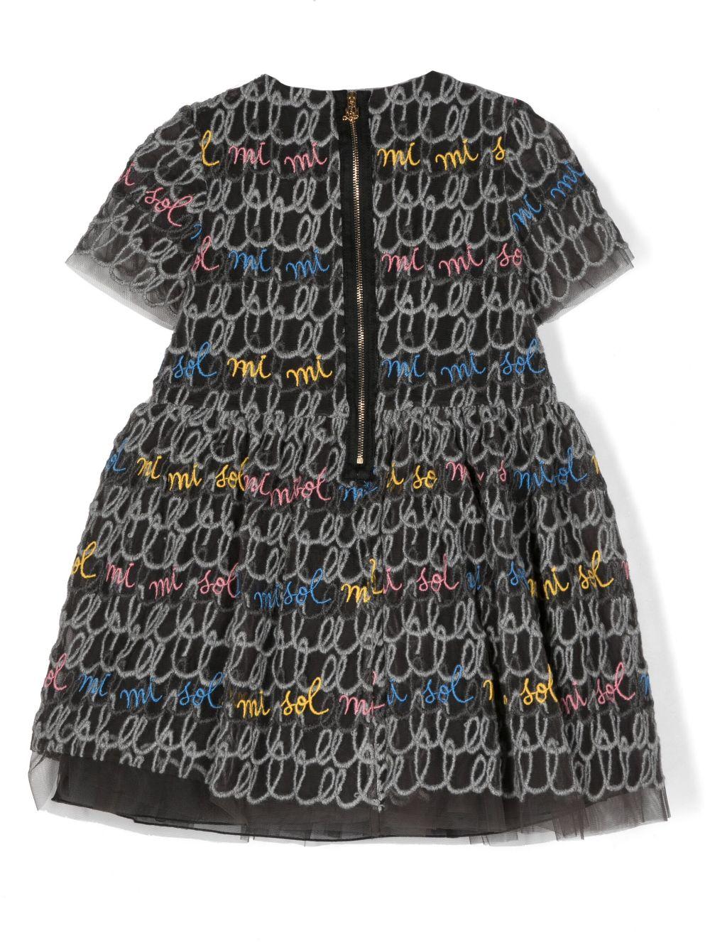 Abito grigio bambina,con fiocco laterale,scollo rotondo,primo velo in tulle,gonna svasata e chiusura posteriore con zip