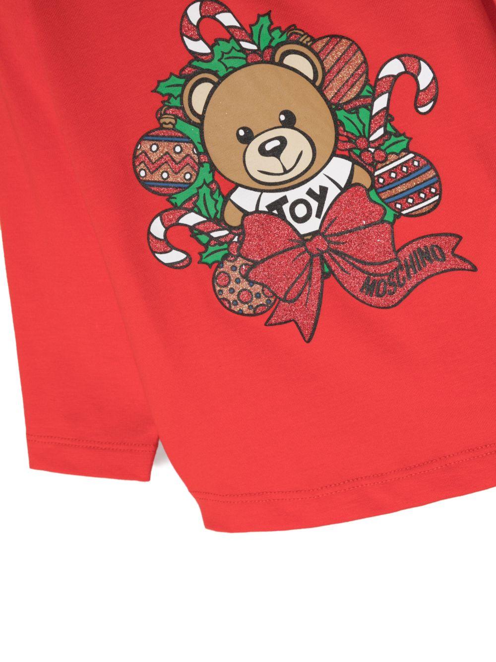 Felpa rosso papavero,caratteristica stampa Leo Teddy, dettaglio con glitter, girocollo, chiusura con bottoni a pressione sulla spalla, maniche lunghe e orlo dritto