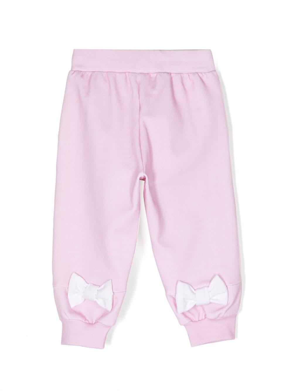 Pantalone rosa neonata con applicazioni posteriori