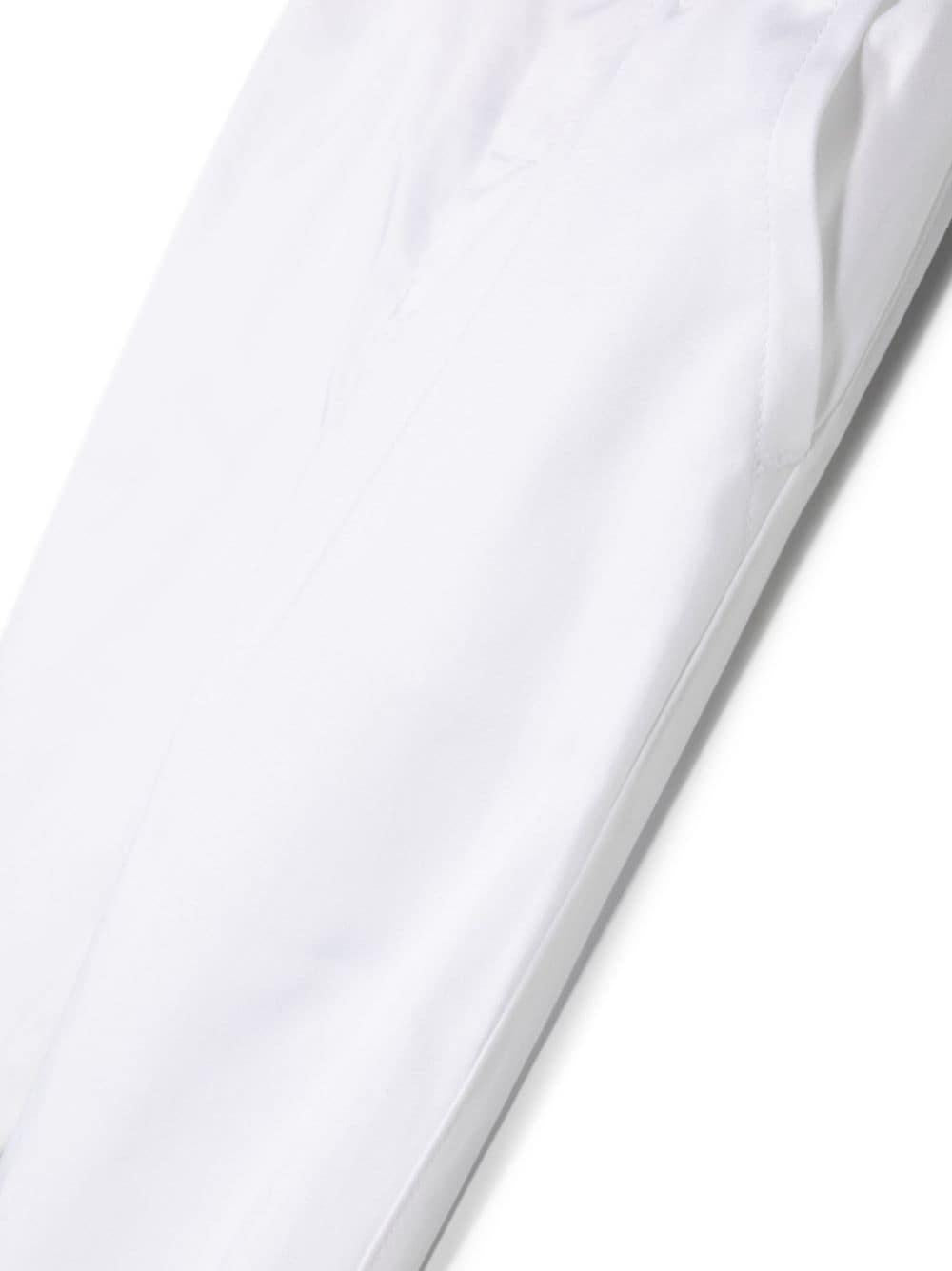 Pantaloni bianchi neonato