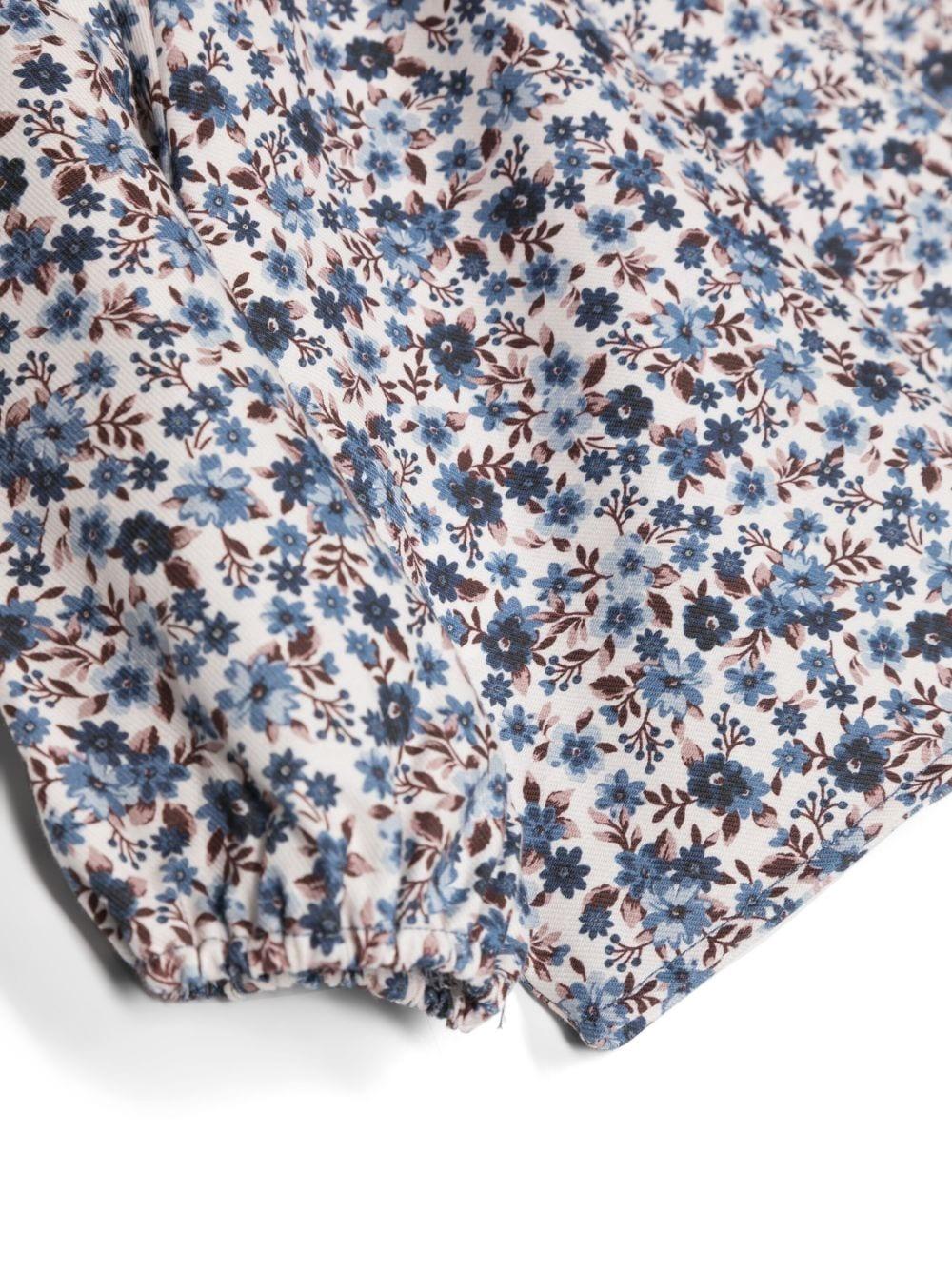 Camicia blu chiara neonata con stampa a fiori