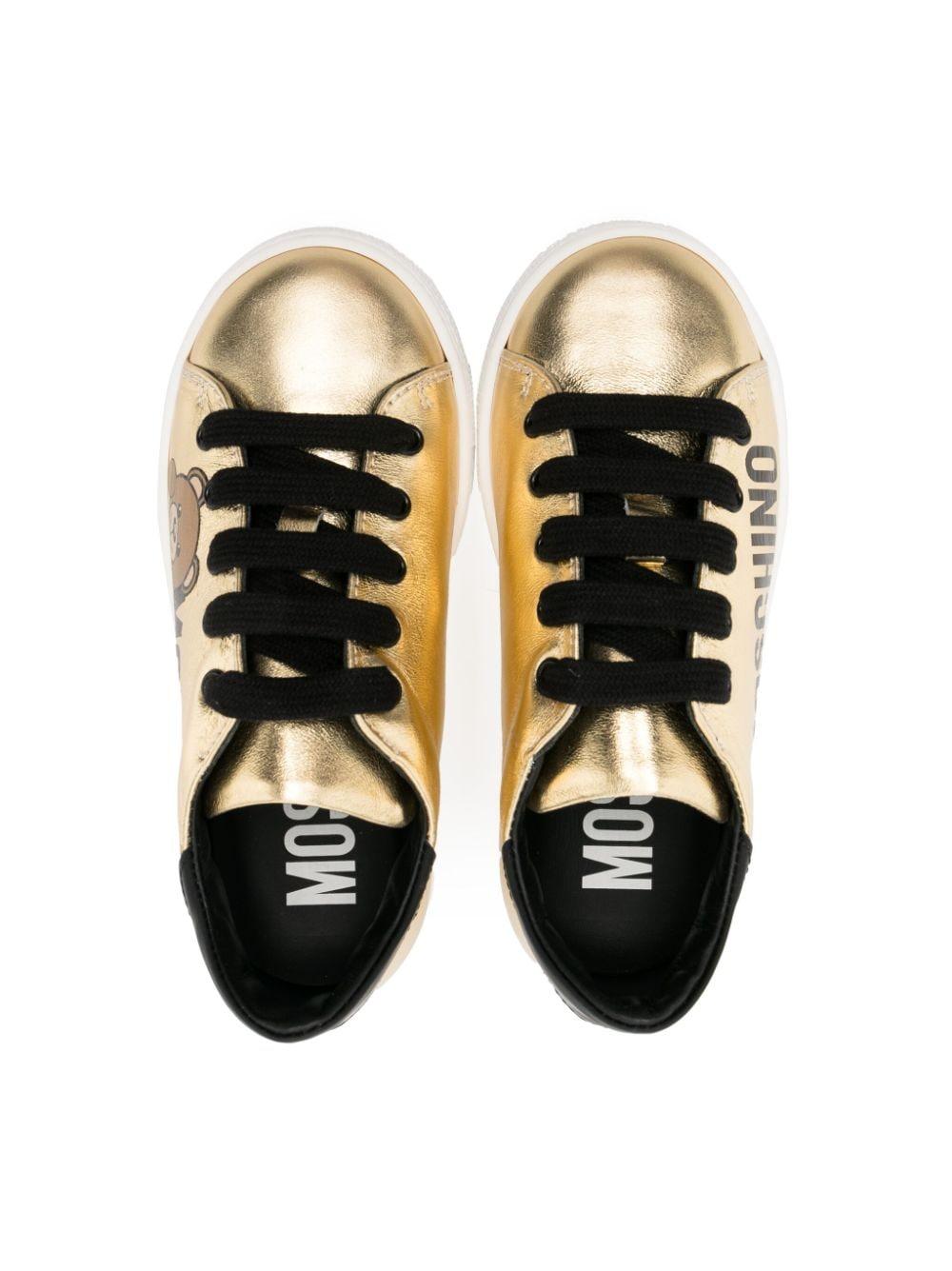 Sneakers oro con dettagli neri 75856 VAR01 MOSCHINO KIDS 