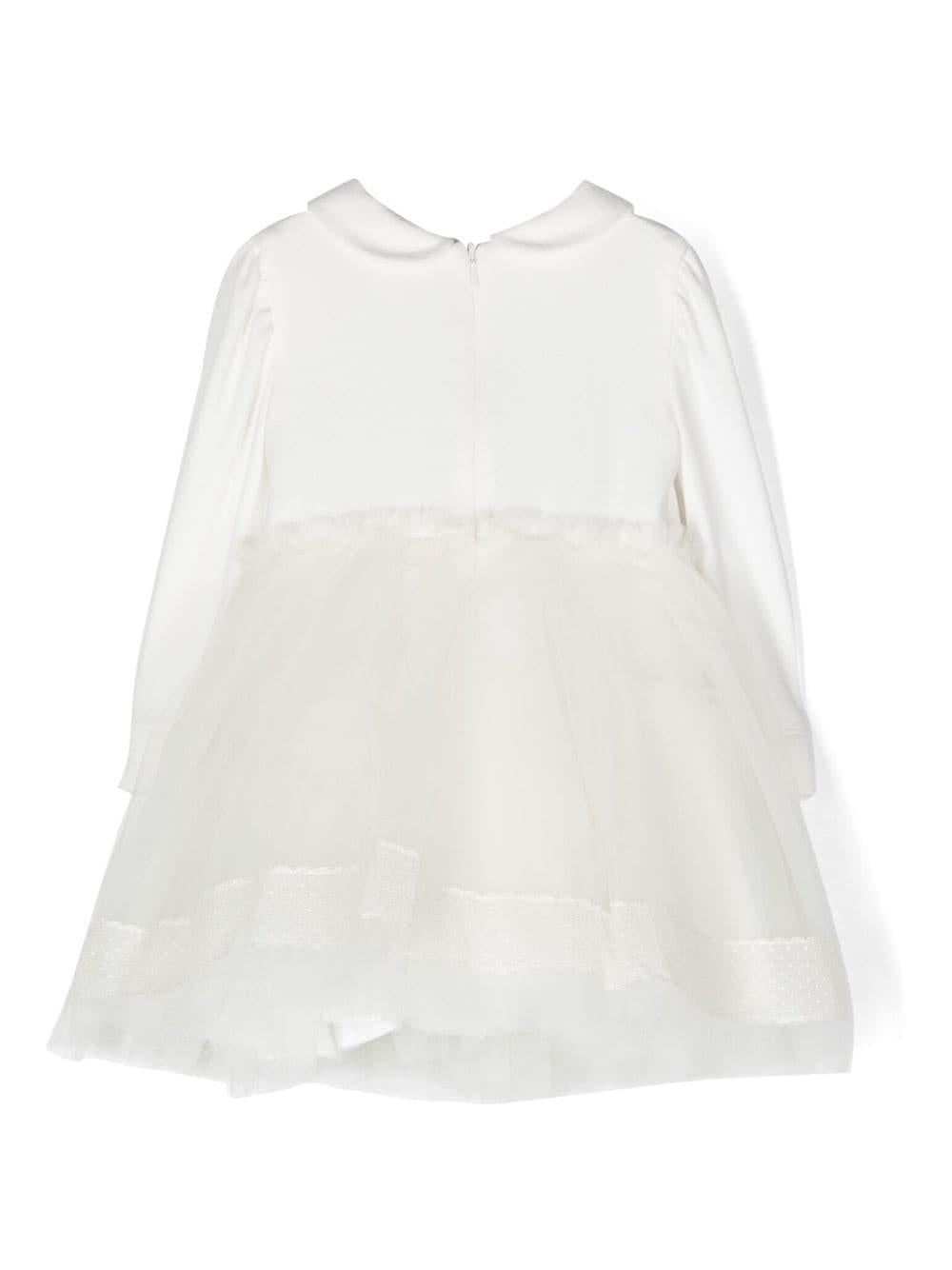 Abito bianco neonata in tulle a maniche lunghe