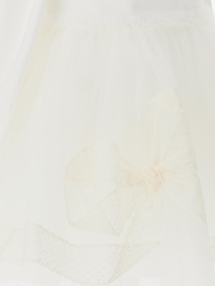 Abito bianco neonata in tulle a maniche lunghe