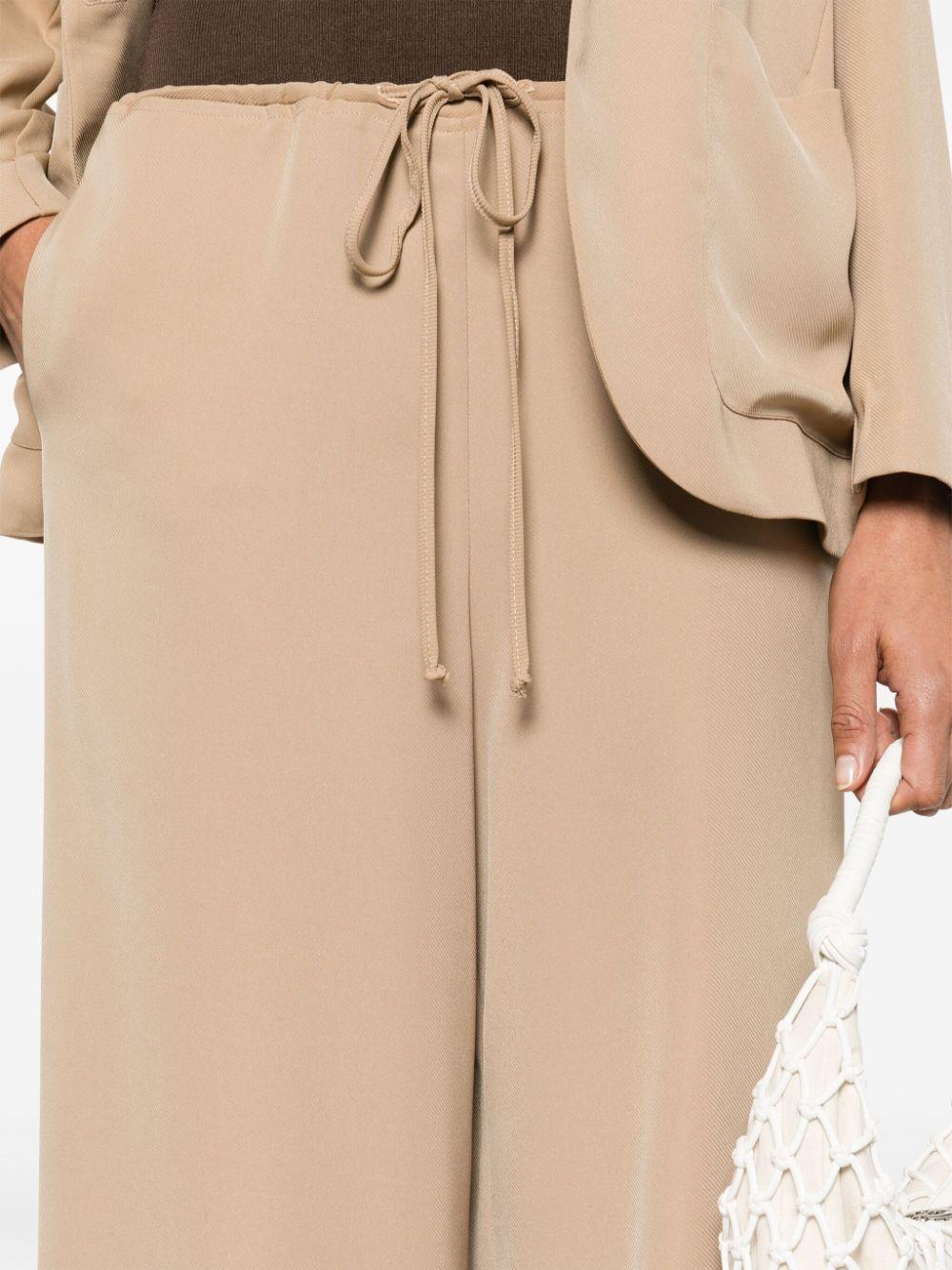 Pantaloni beige donna