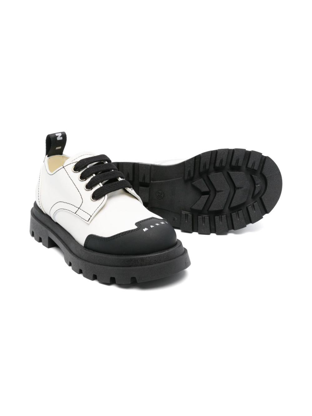 Scarpe bianco/nere bambina