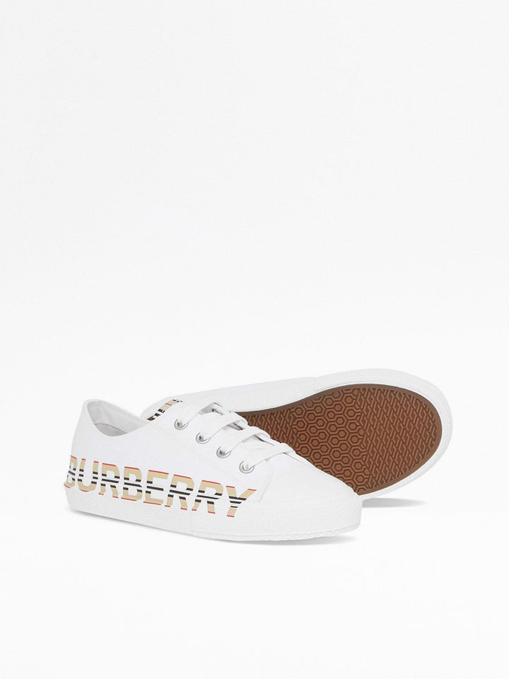 Sneakers bianche con inserti check e logo