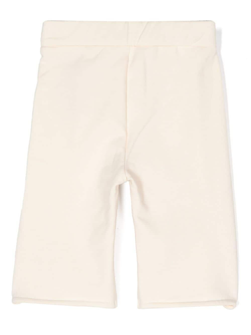 Pantaloni crema neonata