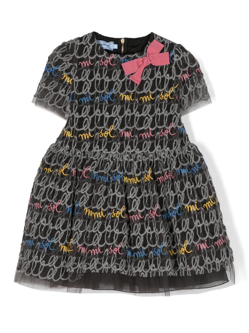 Abito grigio bambina,con fiocco laterale,scollo rotondo,primo velo in tulle,gonna svasata e chiusura posteriore con zip