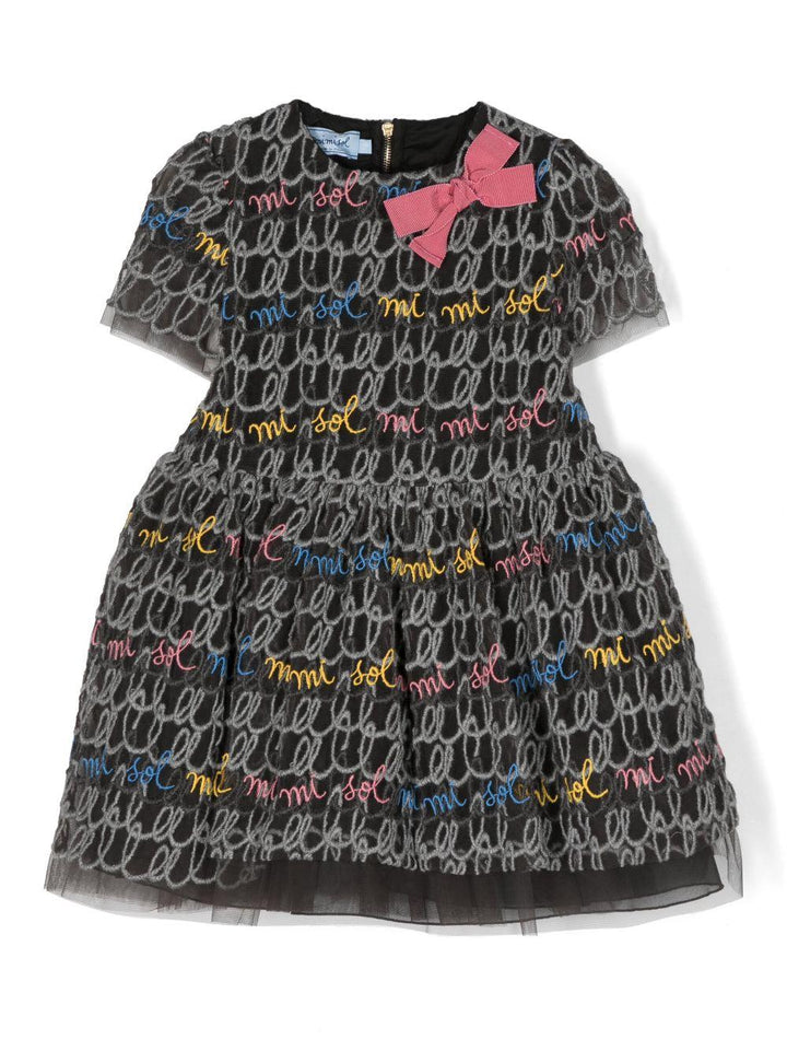 Abito grigio bambina,con fiocco laterale,scollo rotondo,primo velo in tulle,gonna svasata e chiusura posteriore con zip