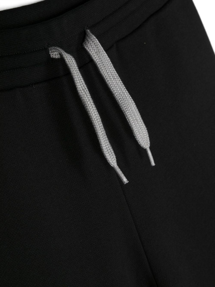 Pantaloni sportivi bambino neri con coulisse bianca