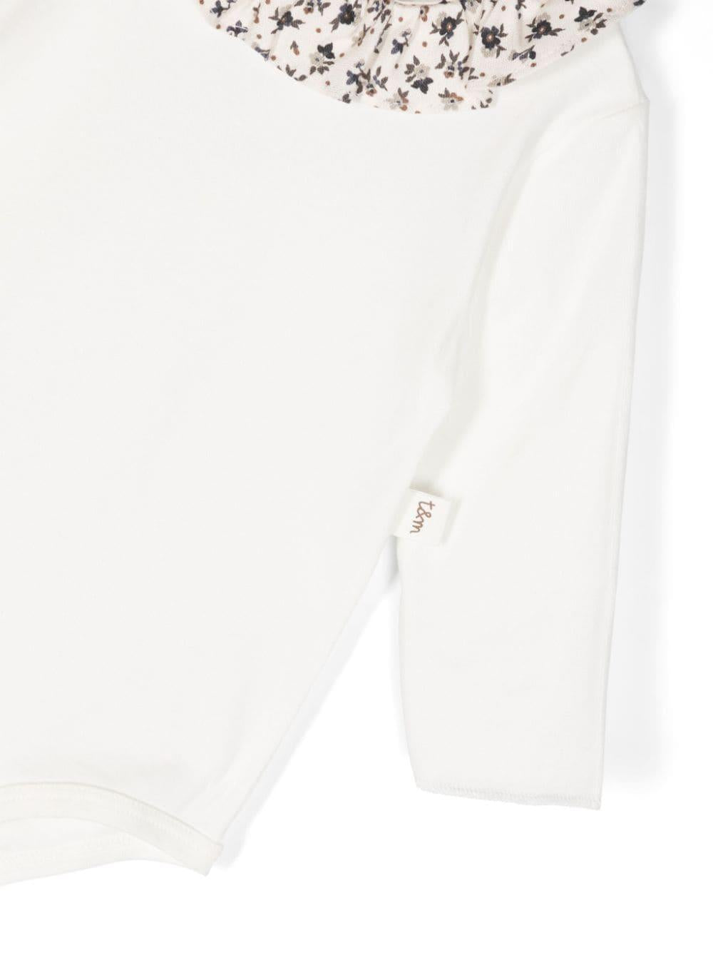 Body bianco neonata con motivo a fiori