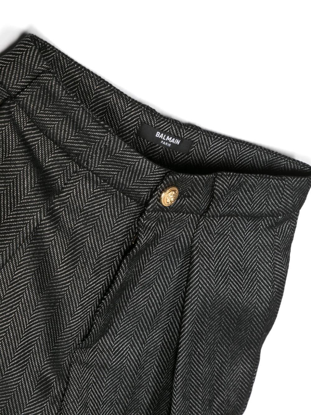 Pantaloni neri bambino con logo
