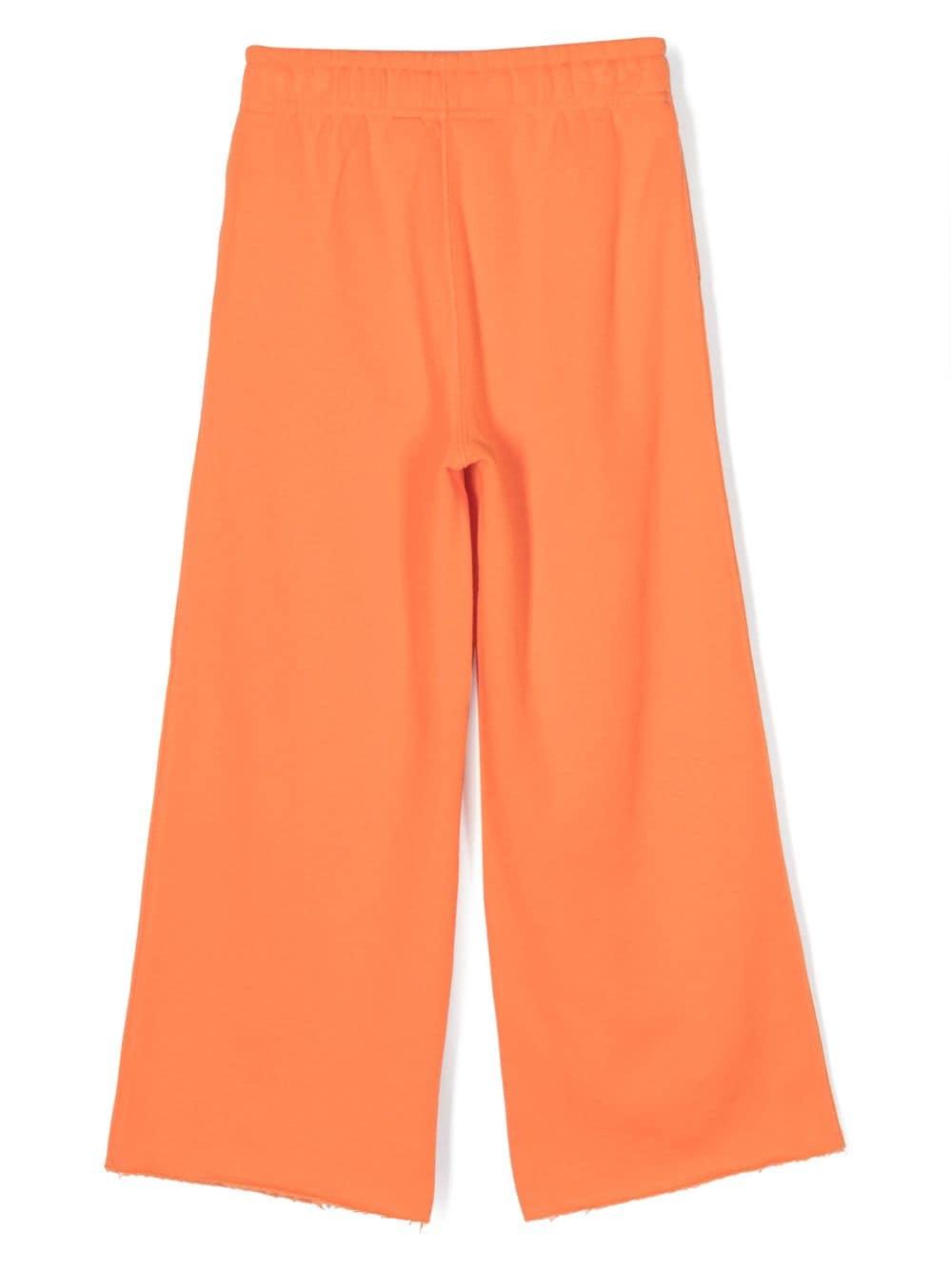 Pantaloni arancione bambina con ricamo