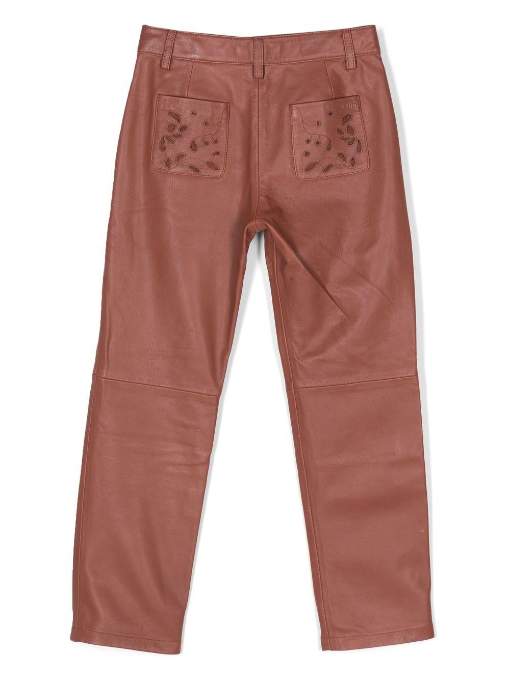 Pantaloni bambina rosso mattone