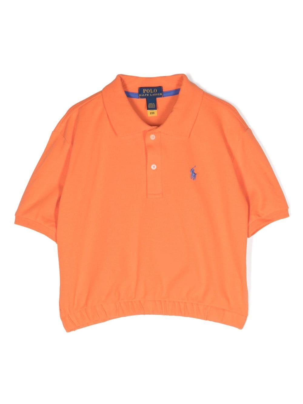 Polo arancione bambina con logo